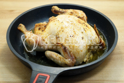 Запечь курицу в духовке целиком при температуре 180 градусов С 40 минут.